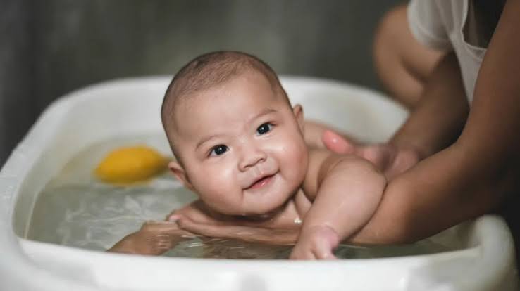 baby having bath